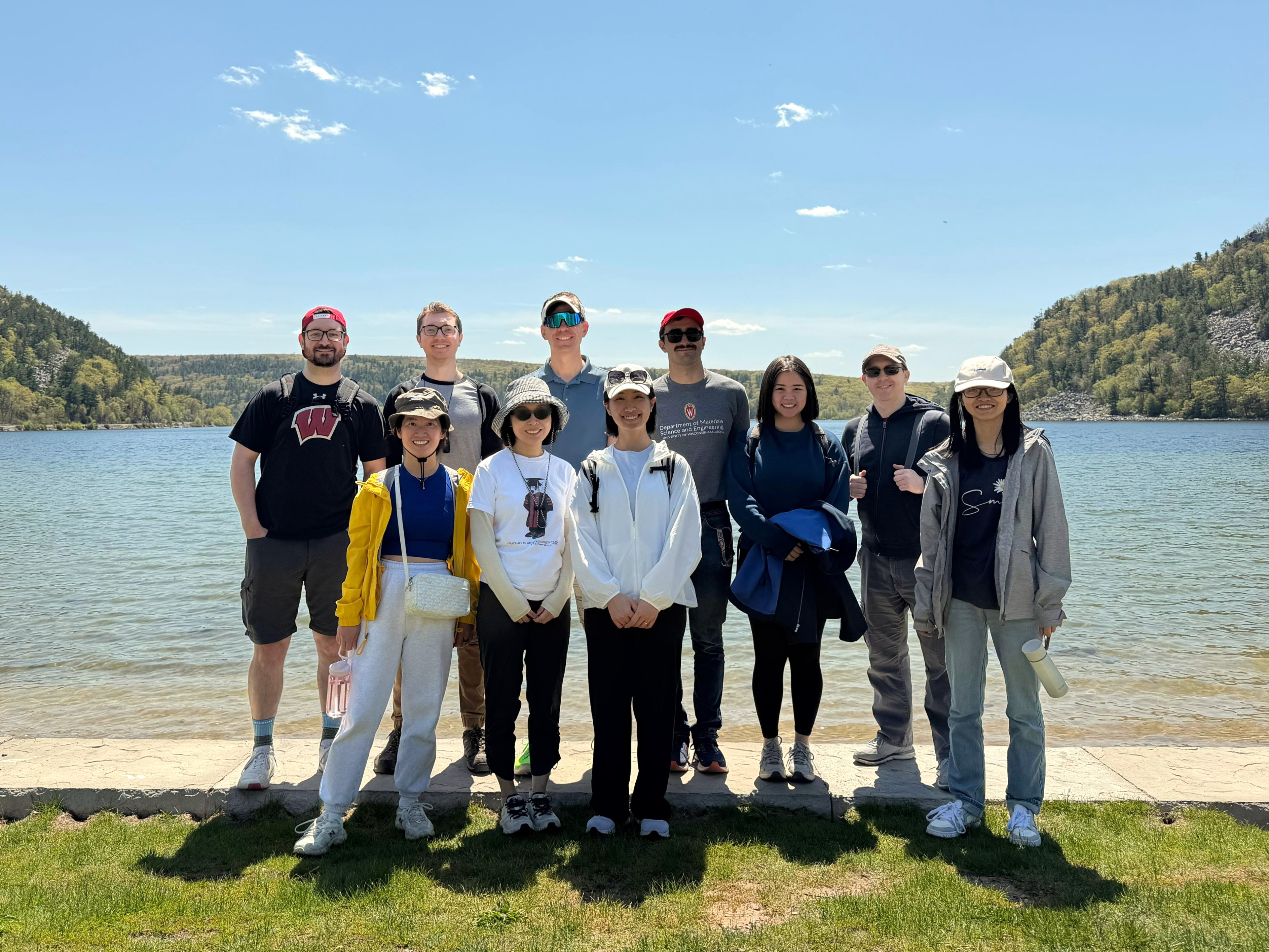 members standing in front of Devil's lake